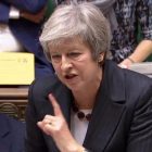 Theresa May en la Cámara de los Comunes.-AFP