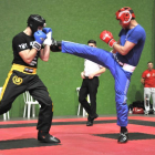 Uno de los combates de kickboxing celebrados ayer en La Juventud.-MARÍA FERRER