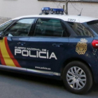 Coche patrulla de la Policía Nacional-MANUEL LORENZO / EFE