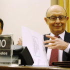 El ministro de Hacienda, Cristóbal Montoro, en la Comisión de Economía y Hacienda del Congreso de los Diputados este jueves.-AGUSTIN CATALAN