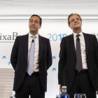 El presidente de CaixaBank, Jordi Gual, y el consejero delegado, Gonzalo Gortázar, en la presentación de los resultados de 2018.-MIGUEL LORENZO