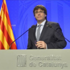 El 'president' Puigdemont en la rueda de prensa de presentación del plan de Govern.-FERRAN SENDRA