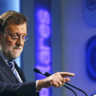 El líder del PP, Mariano Rajoy, durante una rueda de prensa.-EFE