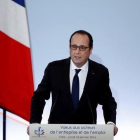 El presidente francés, François Hollande, durante la presentación del plan de choque contra el desempleo de larga duración.-AP / YOAN VALAT