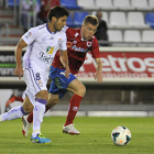 El centrocampista Juanma Espinosa junto al Vicente durante el partido que el Real Jaén disputó en Los Pajaritos. / DIEGO MAYOR-