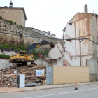 Las máquinas derribaron los primeros edificios-A.M.