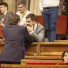 El president Carles Puigdemont junto a Jordi Sànchez (ANC).-JULIO CARBÓ