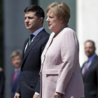 Merkel, durante su temblor junto al presidente ucraniano.-AP / MICHAEL SOHN
