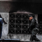 Búsqueda de pruebas tras el atentado a Maduro.-AFP / JUAN BARRETO