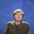 La cancillera alemana, Angela Merkel, antes de una rueda de prensa en Berlín.-MICHAEL KAPPELER