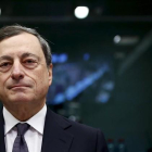 Mario Draghi, presidente del Banco Central Europeo, en la reunión de enero del Eurogrupo en Bruselas.-FRANCOIS LENOIR