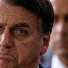 Brazil s President-elect Jair Bolsonaro speaks to media at the transition government building in Brasilia.-