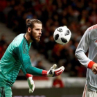 David de Gea  y Gerard Pique, durante el partido amistoso España-Argentina.-MARISCAL