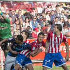Los jugadores del Numancia celebran uno de los dos goles logrados ante el Sporting. / ÁREA 11-