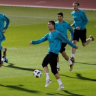 Jugadores del Madrid, durante el entrenamiento de este viernes.-REUTERS / AMR ABDALLAH DALSH