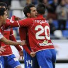 Los jugadores del Numancia celebran el primer gol anotado ante el Racing. / DIEGO MAYOR-