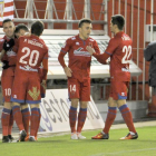 Los jugadores del Numancia celebran el tanto de Mateu que iba a dar la victoria ante el Almería.-María Ferrer