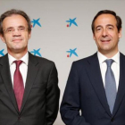 Jordi Gual y Gonzalo Gortázar, presidente y consejero delegado de CaixaBank.-EL PERIÓDICO