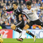 André Gomes, con el Valencia, en un partido contra el Madrid.-MIGUEL LORENZO