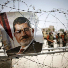 Retrato del derrocado presidente egipcio Mohamed Mursi en el Cairo tomada el 6 de julio del 2013.-Foto: REUTERS / KHALED ABDULLAH