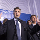 El líder de la Unión Democrática Croata, Andrej Plenkovic, celebra su victoria.-ANTONIO BAT / EFE