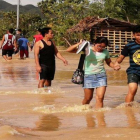 Inundaciones en Filipinas tras el paso  de un tifón.-EFE