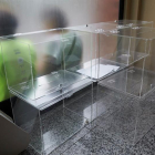 Urnas que iban a ser destinadas a la campaña para el referéndum del 1 de octubre guardadas en la sede de Asamblea Nacional Catalana (ANC) antes de un registro de la Guardia Civil.-EFE