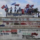 Simpatizantes sandinistas protestan durante una marcha en favor del Gobierno nicaragüense.-ALFREDO ZUÑIGA (AP)