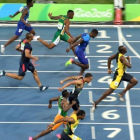 Usain Bolt, en su esprint final hacia el oro de los 100 metros.-REUTERS / ERIC FEFERBERG