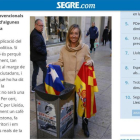 Caputra de pantalla de la entrevista en formato digital en la que la candidata por Lleida del PP, Marisa Xandri, se fotografió lanzando una estelada a la papelera.-/ ÒSCAR MIRÓN (SEGRE.COM)