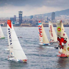 Imagen de la salida de la tercera Barcelona World Race, el 31 de diciembre del 2014, con la ciudad al fondo.-BWR