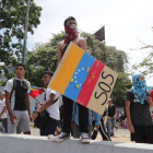 Opositores participan en una manifestacion en las calles de Caracas, Venezuela.-EFE