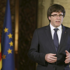 El presidente de la Generalitat, Carles Puigdemont, durante su declaración institucional tras la decisión del Gobierno de aplicar el artículo 155 en Cataluña.-EFE/ RUBEN MORENO GARCÍA / GENERALITAT DE CATALUÑA