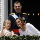 La princesa Leonor junto a sus padres, el día de la proclamación de Felipe VI, el 19 de junio del 2014.-