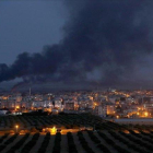 Bombardeos sobre la ciudad siria de Ras al-Ein, vista desde la frontera turca.-EFE EPA / ERDEM SAHIN