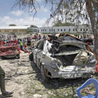 A Somali police officer says a number of people are wounded after a suicide bomber detonated an explosives-laden vehicle at a checkpoint outside the headquarters after being stopped by security forces.-AP