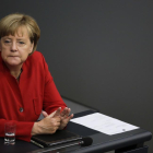 Angela Merkel en el Bundestag.-MARKUS SCHREIBER / AP