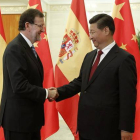 Mariano Rajoy saluda al presidente chino, Xi Jinping, en septiembre del 2014.-Foto: EFE