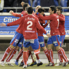 Los jugadores del Numancia celebran el gol de Dimas en el descuento. / ÚRSULA SIERRA-