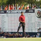 Tiger Woods celebra con rabia su putt en el hoyo 18 de la última vuelta en el PGA-MONTANA PRITCHARD PGA OF AMERICA