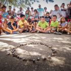 La singular carrera de caracoles de Peroniel en Soria regresa en el marco de las fiestas después de dos años. GONZALO MONTESEGURO
