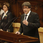 Carles Puigdemont, ayer, en el Parlament.-JULIO CARBÓ