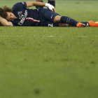 David Luiz se lamenta de su lesión muscular en la pierna izquierda en el partido contra el Marsella.-Foto:   REUTERS / ERIC GAILLARD