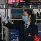 Control para detectar el contagio de coronavirus en la ciudad china de Nanning, este martes.-EUROPA PRESS