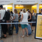 Mostradores de facturación de Vueling, en el aeropuerto de El Prat. /-ELISENDA PONS