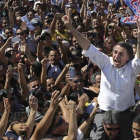 El candidato presidencial ultraderechista brasileño Jair Bolsonaro en un acto político el miércoles en Brasilia.-AP / ERALDO PERES