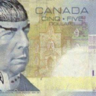 Un billete adulterado de 5 dólares canadienses.-