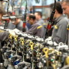 Cadena de montaje de una planta de fabricación de automóviles.-