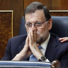 El presidente del Gobierno en funciones, Mariano Rajoy, en su escaño del Congreso.-JUAN MANUEL PRATS