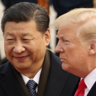 Xi Jinping y Donald Trump, en un encuentro en Pekín, el año pasado.-ANDREW HARNIK (AP)